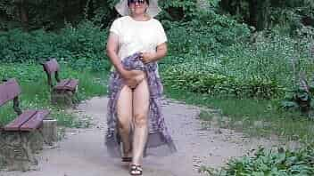 Chubby mature woman show hairy pussy in the park video