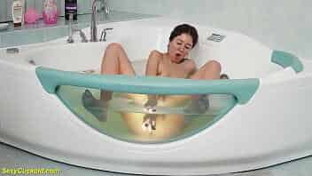 sweet nipple pierced teen Katty West toying her tight cunt under water at the glass bathtub video